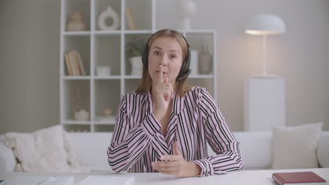 portrait-of-young-woman-talking-by-internet-using-headphones-with-microphone-active-sales-manager-working-remotely